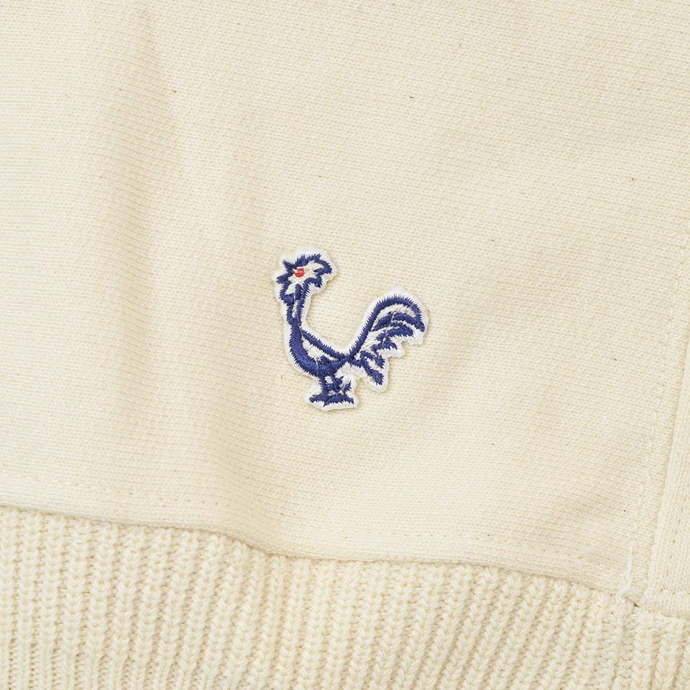 コンションキネットCONCHONQUINETTEプルオーバーパーカーメンズフーディーTHEFATHOODIEオフホワイトエクリュオーガニックコットンフレンチテリーアイコンパッチ国内正規品でらでら公式ブランド