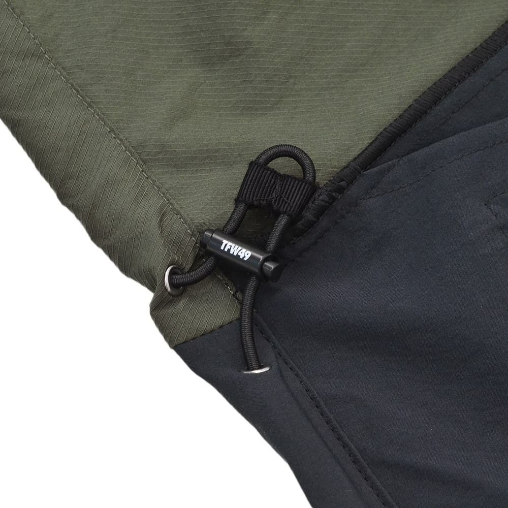 TFW49ティーエフダブリューフォーティーナインコーチシャツメンズ半袖切り替えデザインブラック×カーキポリエステル吸水速乾接触冷感UVカット国内正規品でらでら公式ブランド