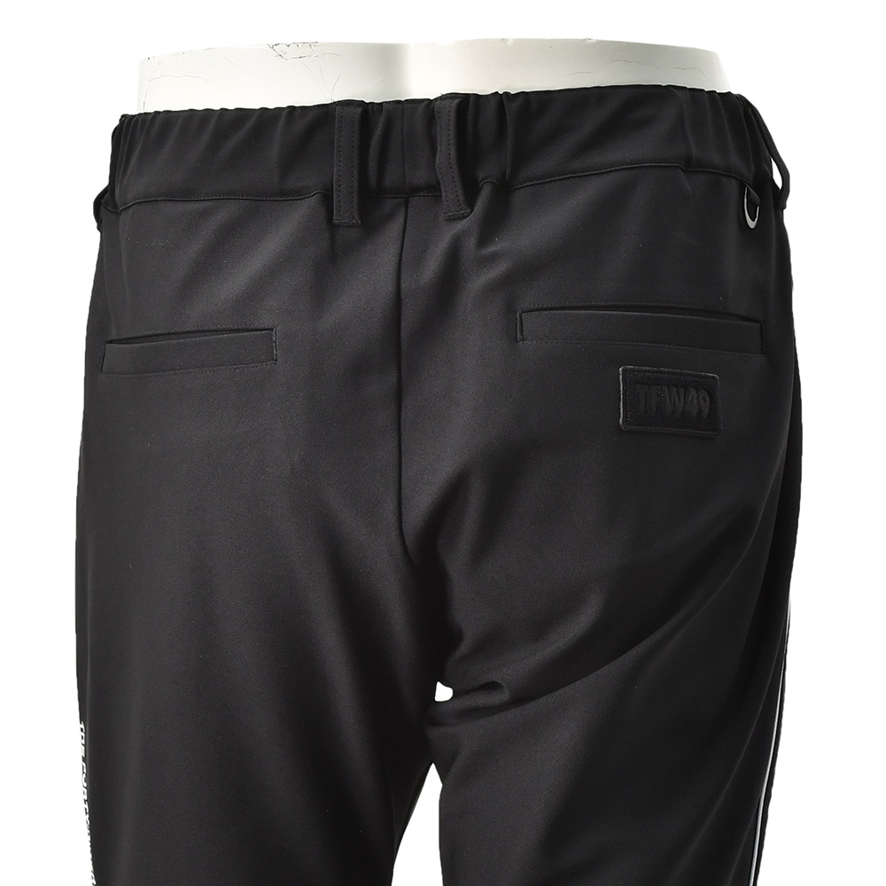 TFW49ティーエフダブリューフォーティーナイントラックパンツメンズジャージーパンツブラック黒配色パターン異素材切り替え2WAYキックバックUVカット吸水速乾多機能国内正規品でらでら公式ブランド