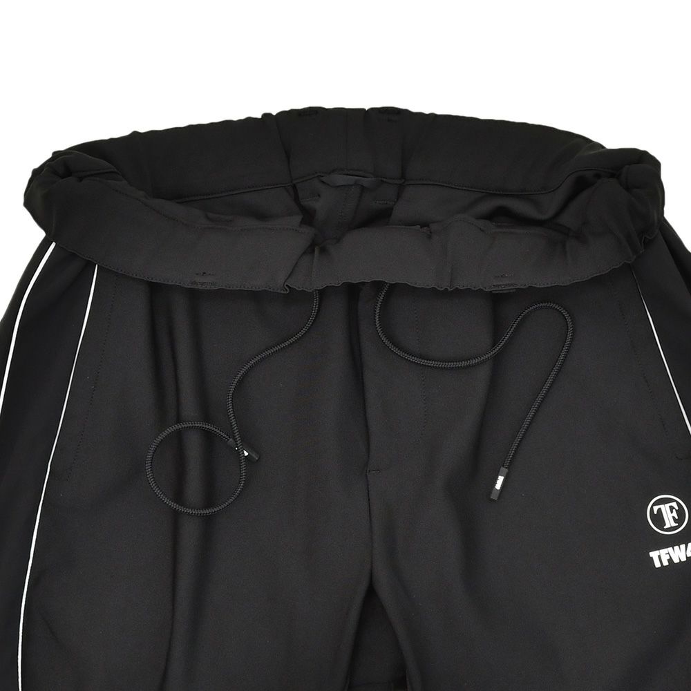 TFW49ティーエフダブリューフォーティーナイントラックパンツメンズジャージーパンツブラック黒配色パターン異素材切り替え2WAYキックバックUVカット吸水速乾多機能国内正規品でらでら公式ブランド
