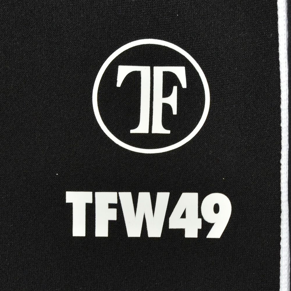 TFW49ティーエフダブリューフォーティーナイントラックパンツメンズジャージーパンツブラック黒配色パターン異素材切り替え2WAYキックバックUVカット吸水速乾多機能国内正規品でらでら公式ブランド