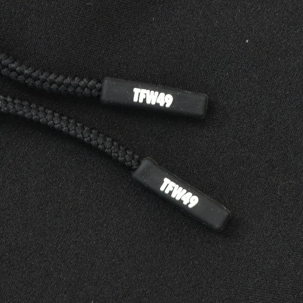 TFW49ティーエフダブリューフォーティーナイントラックパンツメンズジャージーパンツブラック黒配色パターン異素材切り替え2WAYキックバックUVカット吸水速乾多機能国内正規品でらでら公式ブランド